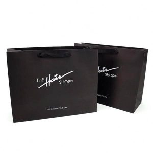tilpasset mærke trykt logo luksus boutique shopping papir gaveposer til frisørsalon 1