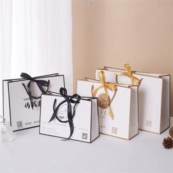 Wholesale Eco-friendly paper bags with your own logo handles custom Reusable packaging shopping Giftluxury jewelry clothing bags - 2