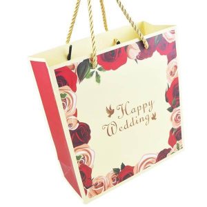 wholesale custom printed luxury christmas gift bag shopping wedding packaging paper gift bag with ribbon 1