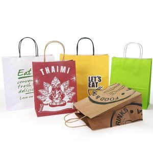 卸し売り注文のロゴはねじられた平らなハンドルが付いている茶色のクラフト紙袋の買物をする食品包装を離れて印刷された安くリサイクルします 1 を取ります